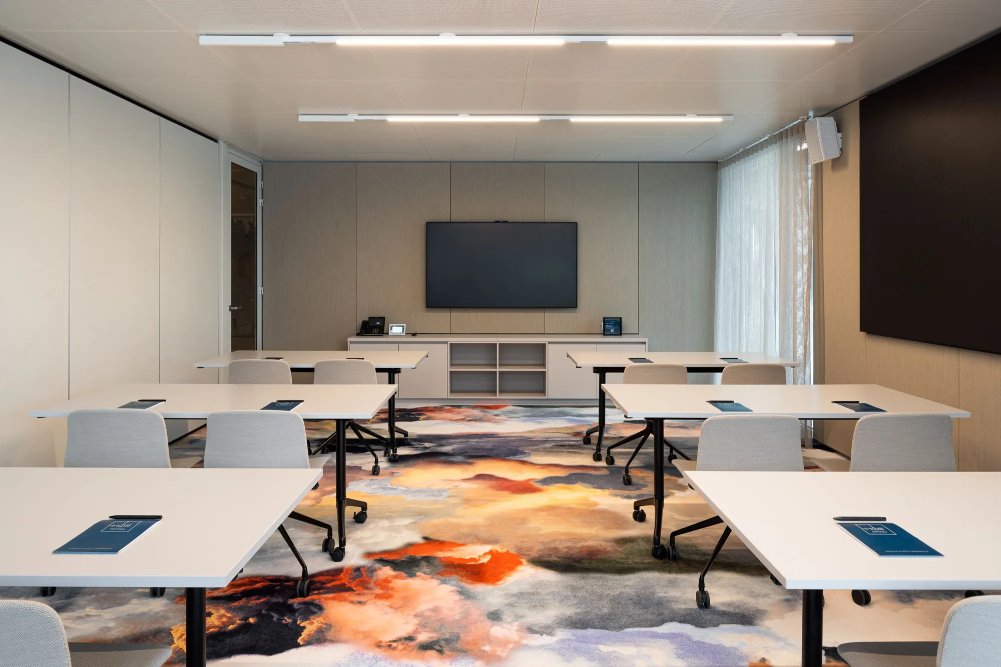 HOFF meeting room with large screen for presentations