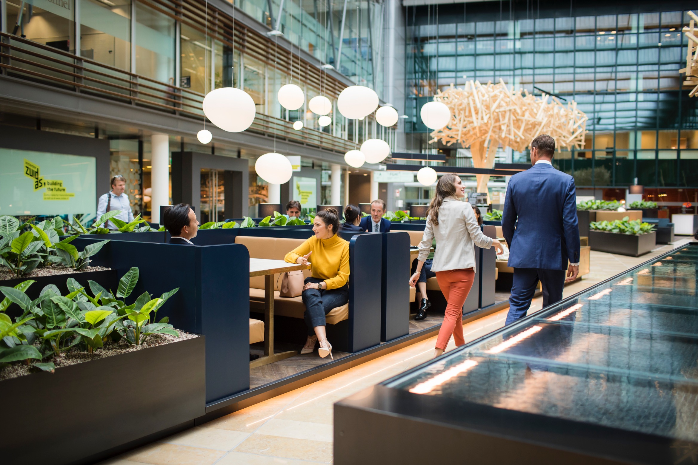 Members having lunch in the atrium